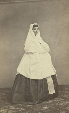 Full-length portrait of Georgian woman, facing right, between 1870 and 1886. Creator: Unknown