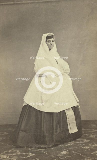 Full-length portrait of Georgian woman, facing right, between 1870 and 1886. Creator: Unknown.