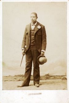 Full length portrait of man with bowler hat and cane, c1890-c1899. Creator: Anderson