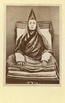 Full-length portrait of the grand lama of the Selenginsk lamasery, seated..., between 1870 and 86. Creator: Unknown