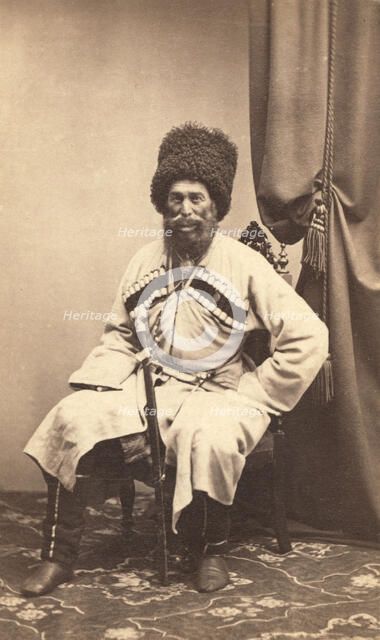 Full-length portrait of Transcaucasian man, seated, facing front, between 1870 and 1886. Creator: Unknown.