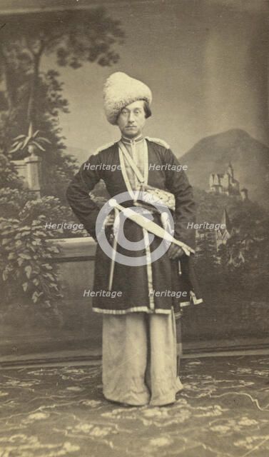 Full-length portrait of unidentified man in Georgian(?) dress, facing front, between 1870 and 1886. Creator: Unknown.