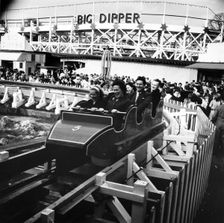 Fun on the Big Dipper at Battersea Funfair, London, 1966. Creator: Henry Grant