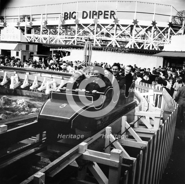 Fun on the Big Dipper at Battersea Funfair, London, 1966. Creator: Henry Grant.