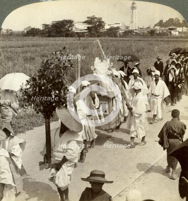 Funeral procession of a rich Buddhist, on the road to Sakai, looking towards Osaka, Japan, 1904.Artist: Underwood & Underwood