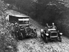 G.W.K passing Napier on very muddy track circa 1915. Creator: Unknown