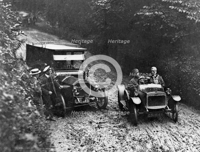 G.W.K passing Napier on very muddy track circa 1915. Creator: Unknown.