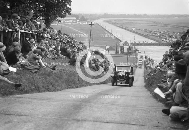 G Dixon's Riley taking part in the JCC Members Day, Brooklands, 4 July 1931. Artist: Bill Brunell.