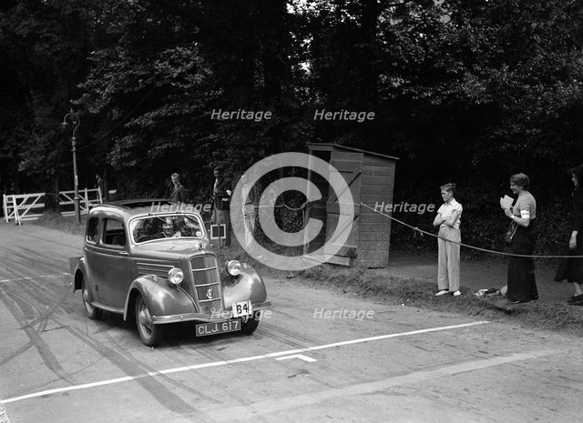 G Kinsey-Morgan's Ford Model C Ten, winner of a silver award at the MCC Torquay Rally, July 1937. Artist: Bill Brunell.