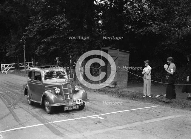 G Kinsey-Morgan's Ford Model C Ten, winner of a silver award at the MCC Torquay Rally, July 1937. Artist: Bill Brunell.