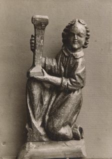Kneeling figure with a candlestick, (1925-1930). Creator: Unknown