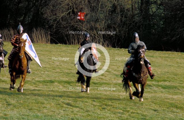 Knights on horseback, during a battle re-enactment. Artist: Geoffrey Davis