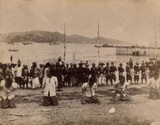 Kowloon, Hong Kong: five pirates awaiting beheading, while Chinese soldiers and dignitaries..., 1891 Creator: Unknown