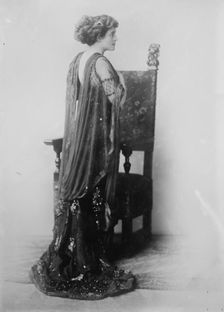 Katherine Kaelred standing before chair, Moffett Studio in Chicago, 1910. Creator: Bain News Service