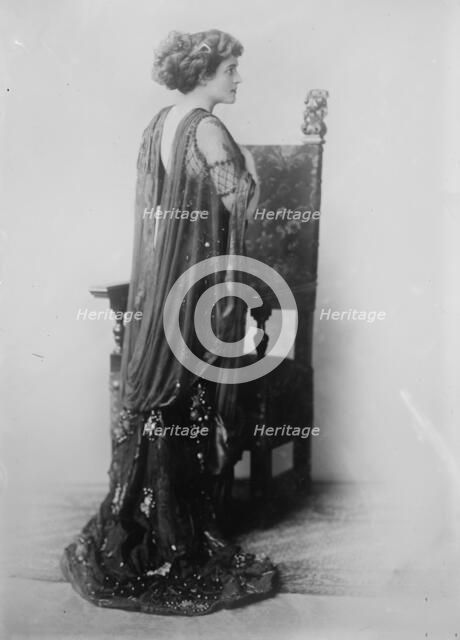Katherine Kaelred standing before chair, Moffett Studio in Chicago, 1910. Creator: Bain News Service.