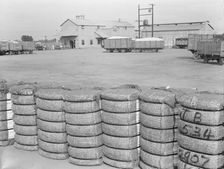Kaweah Delta Cooperative cotton gin and yard, Tulare County, CA, 1938. Creator: Dorothea Lange