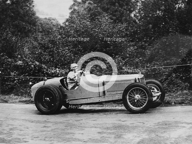 Kay Petre driving a Riley, Autumn Hill Climb, Shelsley Walsh, Worcestershire, 1935. Artist: Unknown