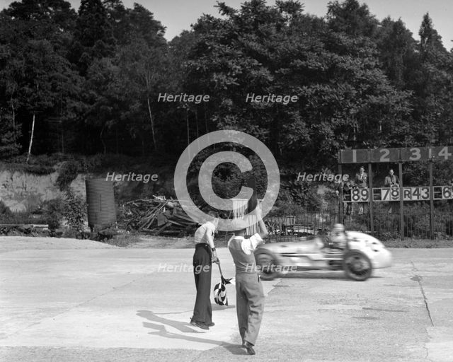 Kay Petre's Austin OHC 744 cc, LCC Relay GP, Brooklands, 26 July 1937. Artist: Bill Brunell.