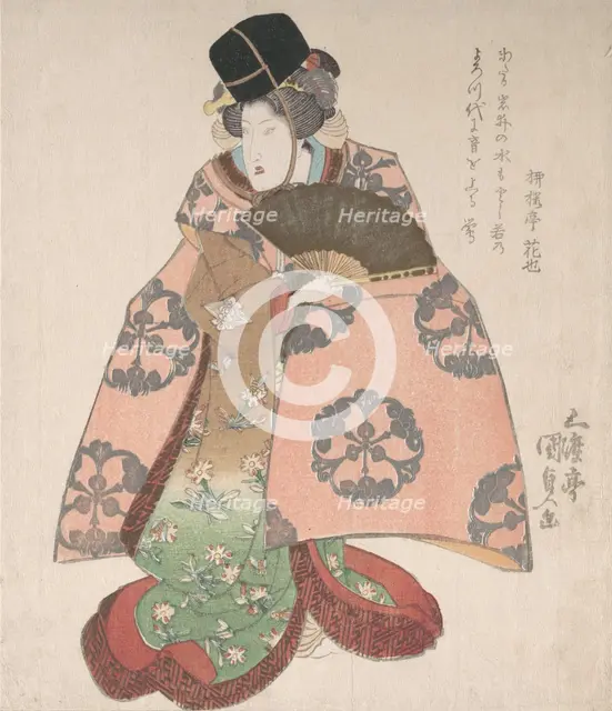 Kabuki Actor in a Female Role Standing with a Fan, 19th century., 19th century. Creator: Utagawa Kunisada.