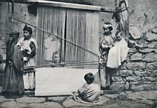 Kabyle weavers and native loom, Northern Algeria, 1912. Artist: Legrand