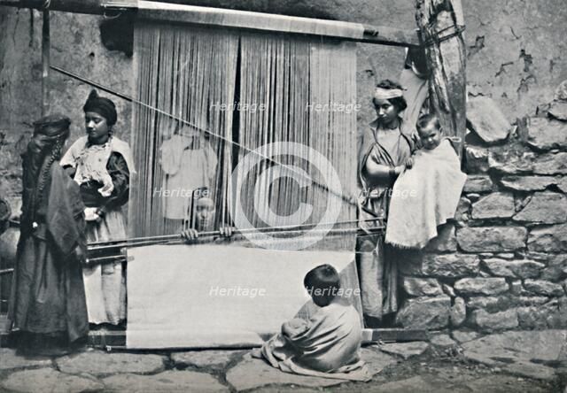 Kabyle weavers and native loom, Northern Algeria, 1912. Artist: Legrand.