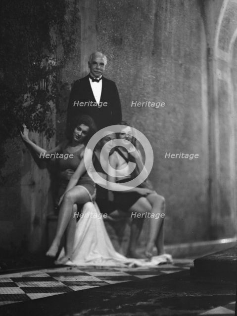 Kahn, Otto H., Mr., and unidentified women, outdoors, 1928 Creator: Arnold Genthe.