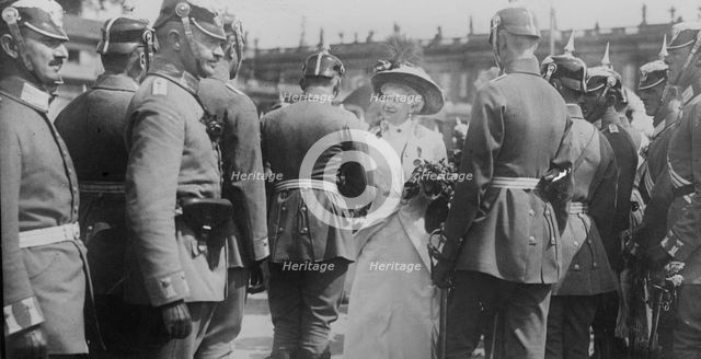Kaiserin gives roses to departing officers, between 1914 and c1915. Creator: Bain News Service.