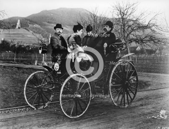Karl Benz with his wife Bertha in a Benz-Viktoria, 1893. Artist: Unknown