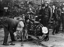 Karl Burlage having his Norton bike weighed for a TT competition
