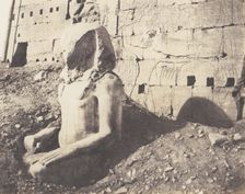 Karnak (Thèbes), Troisième Pylône - Colosse de Spath Calcaire, en D, 1851-52, printed 1853-54. Creator: Félix Teynard