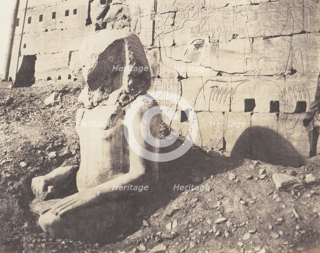 Karnak (Thèbes), Troisième Pylône - Colosse de Spath Calcaire, en D, 1851-52, printed 1853-54. Creator: Félix Teynard.