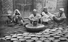 Kashmiri potters at work, 1902. Artist: Bourne & Shepherd
