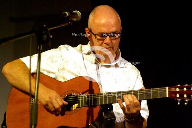 Kevin Armstrong, guitarist, producer, songwriter, and composer, Brecon, 2009. Artist: Brian O'Connor.