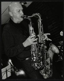 Kelvin Christiane playing two saxophones at The Fairway, Welwyn Garden City, Hertfordshire, 2002. Creator: Denis Williams