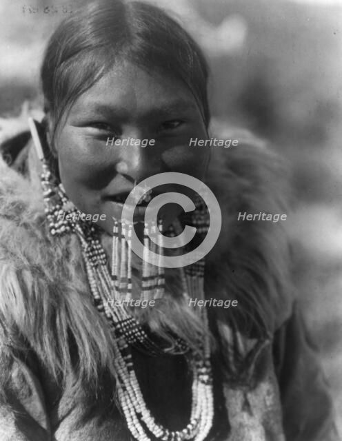Kenowun-Nunivak, c1929. Creator: Edward Sheriff Curtis.