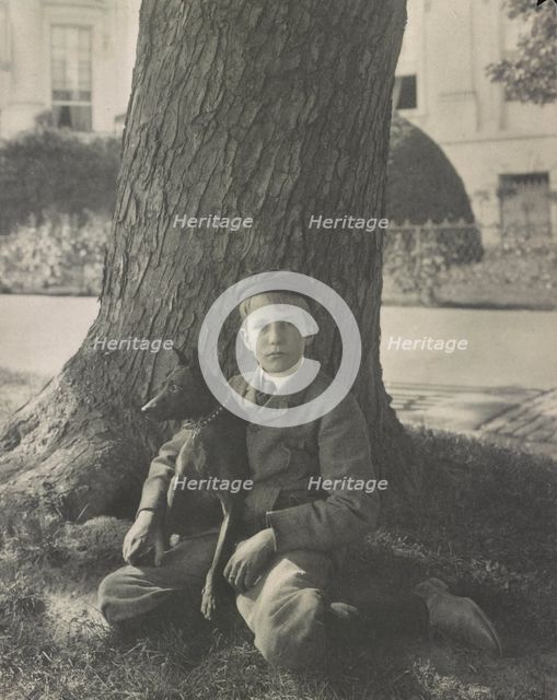Kermit Roosevelt and his dog Jack, 1902. Creator: Frances Benjamin Johnston.