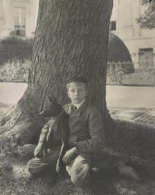 Kermit Roosevelt and his dog Jack, 1902. Creator: Frances Benjamin Johnston