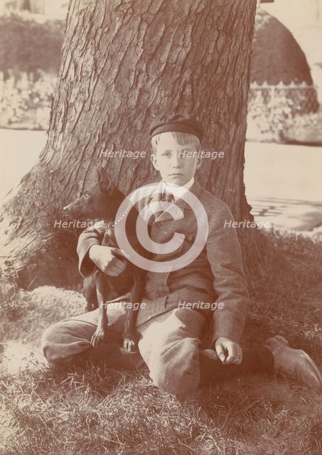 Kermit Roosevelt and Jack, the dog, 1902. Creator: Frances Benjamin Johnston.