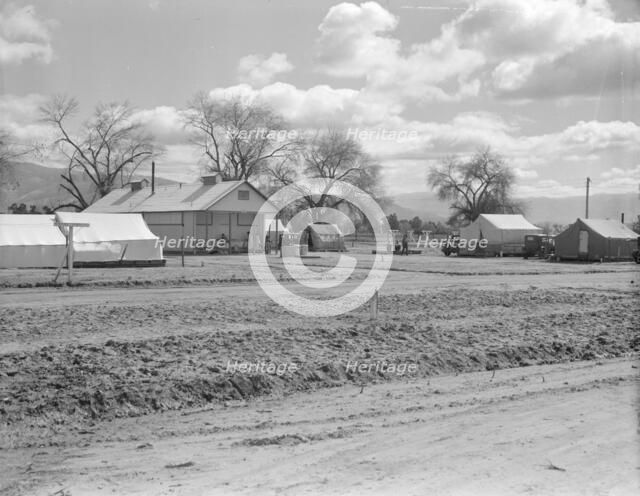 Kern County camp for migrants, fifteen miles out of Bakersfield, California, 1936. Creator: Dorothea Lange.