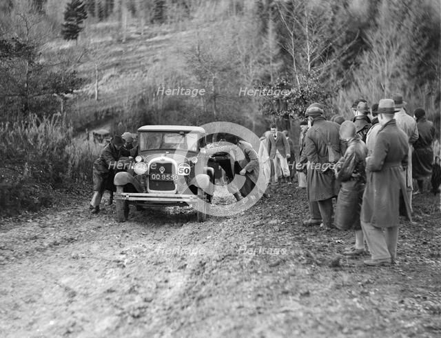 KHL Seaton's Ford Model A saloon receiving a push in the Inter-Varsity Trial, 1930. Artist: Bill Brunell.