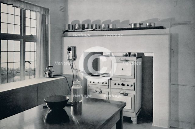 'Kitchen designed by R.W. Symonds', 1938. Artist: Unknown.