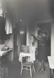 Kitchen of apartment occupied by Negroes, South Side of Chicago, Illinois, April 1941. Creators: Farm Security Administration, Russell Lee