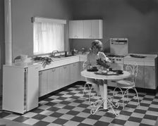 Kitchen scene, Warwick, Warwickshire, 1966. Creator: Michael Walters
