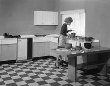 Kitchen scene, Warwick, Warwickshire, 1966. Creator: Michael Walters