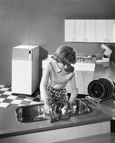 Kitchen scene, Warwick, Warwickshire, 1966. Creator: Michael Walters