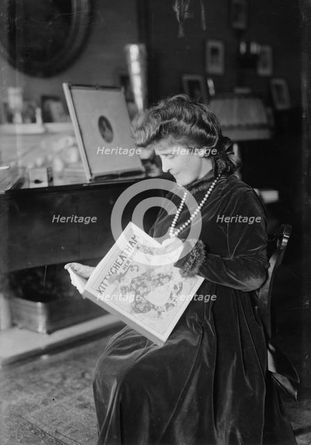 Kitty Cheatham [with her book], 1916. Creator: Bain News Service.
