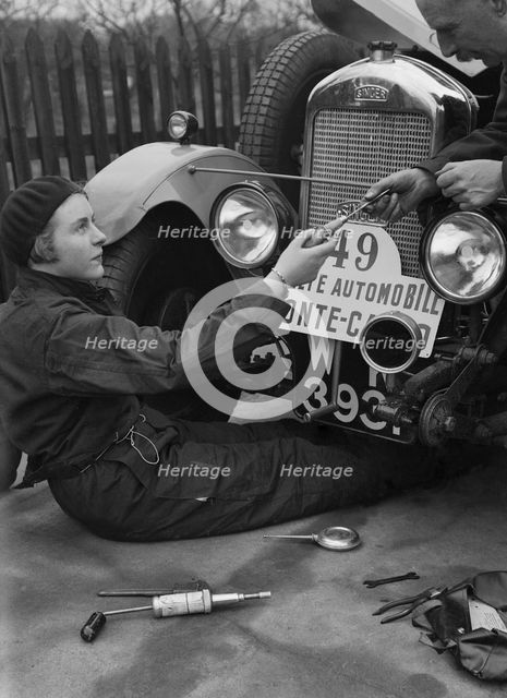 Kitty Brunell working on her Singer Junior, Monte Carlo Rally, 1928. Artist: Bill Brunell.