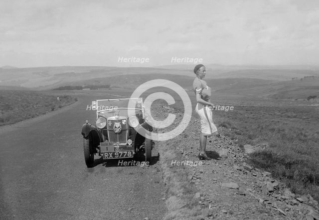 Kitty Brunell and her MG Magna at the RSAC Scottish Rally, 1932. Artist: Bill Brunell.