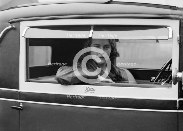 Kitty Brunell behind the wheel of a Talbot 14/45, c1930. Artist: Bill Brunell.