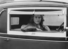 Kitty Brunell behind the wheel of a Talbot 14/45, c1930. Artist: Bill Brunell